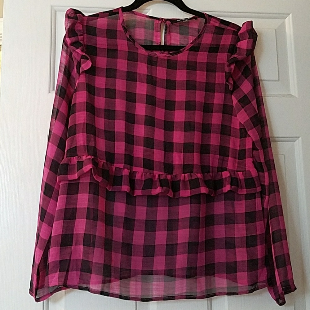 Long sleeved ruffled top